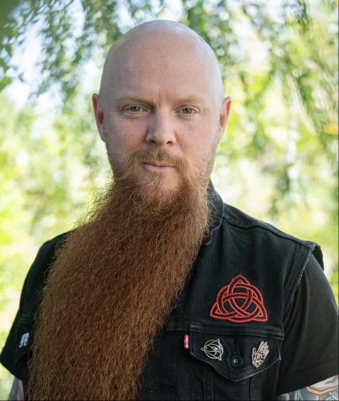Bearded man with a black shirt. Portrait of a bearded man with a black shirt.