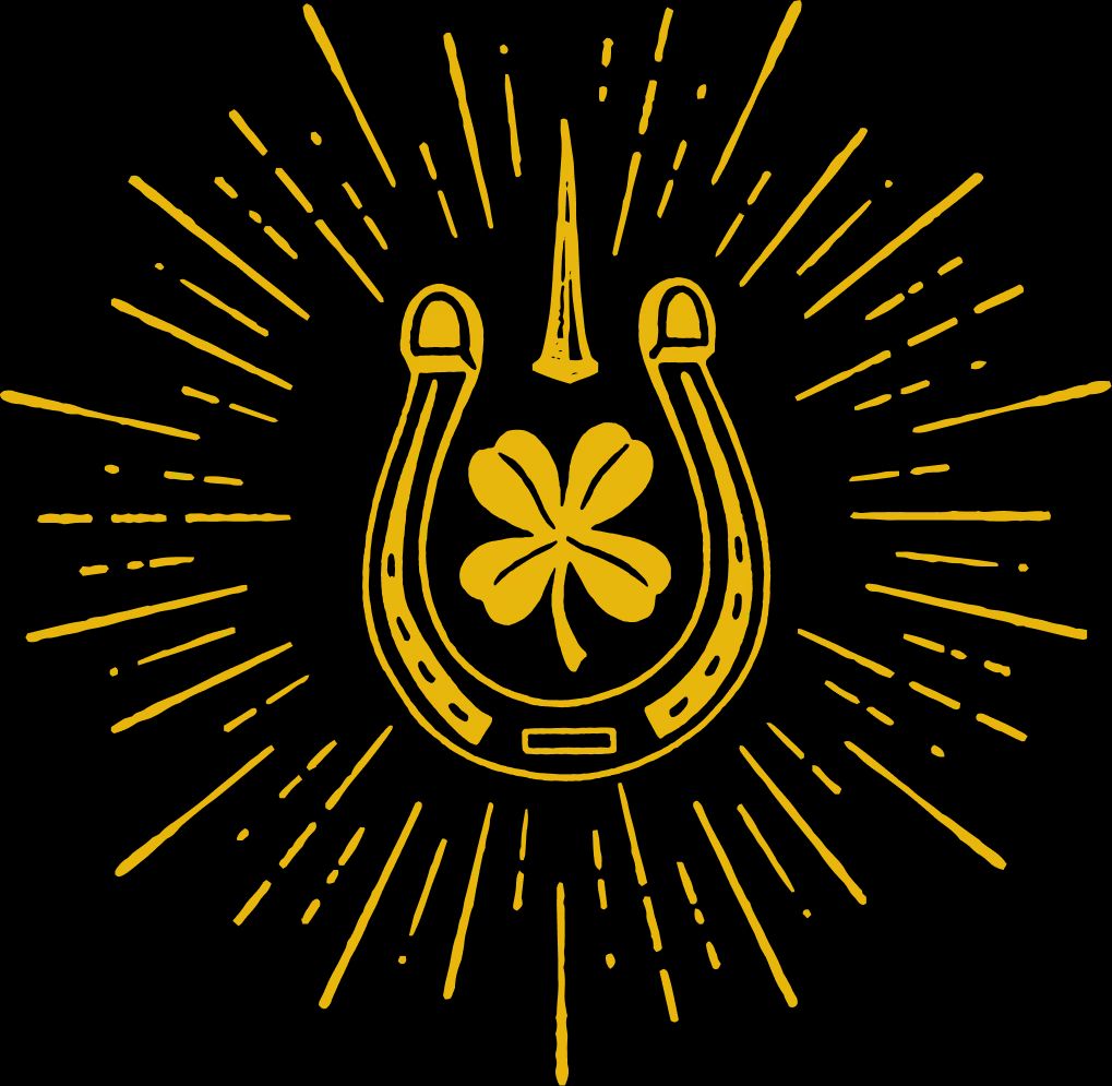 Horseshoe with a clover surrounded by sun rays. Yellow Horseshoe with a clover surrounded by sun rays.